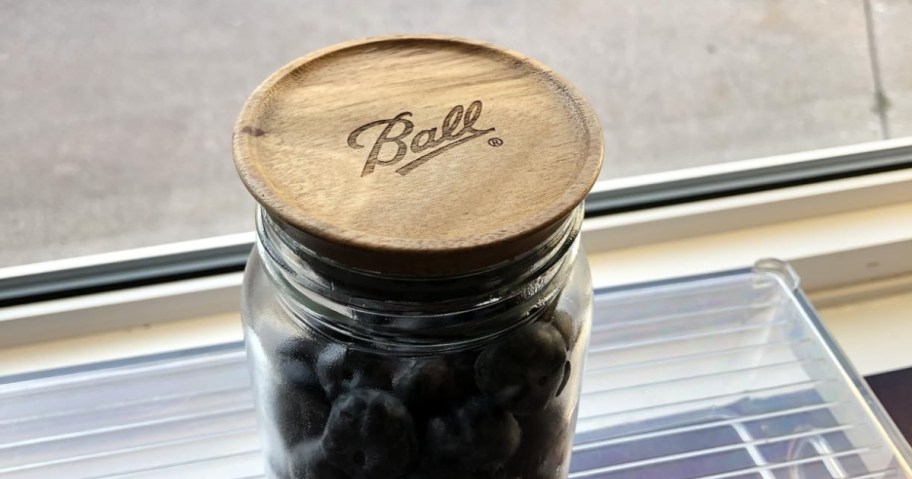 ball mason jar with wooden lid on top