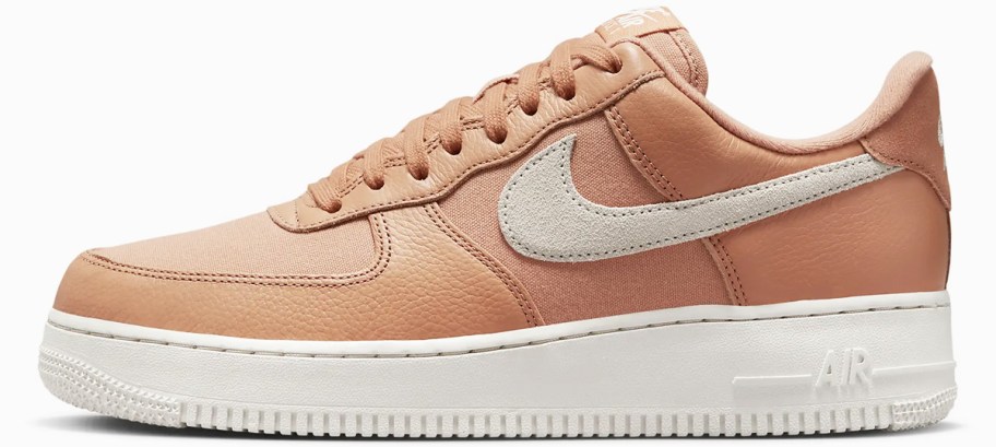 orange and white nike sneaker