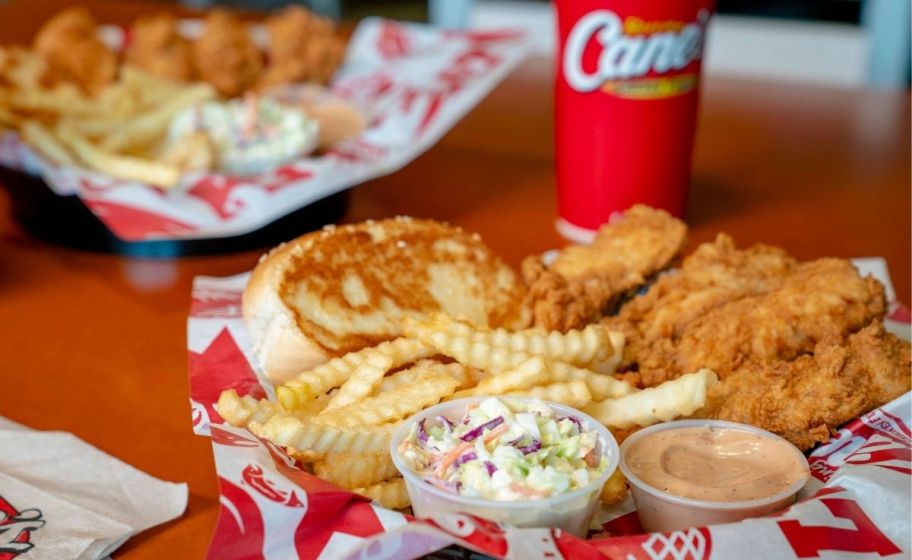 a canes box combo with drink in a basket on a tabletop