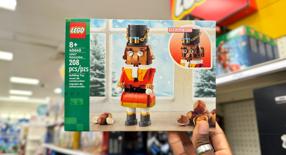 hand holding lego nutcracker box in store
