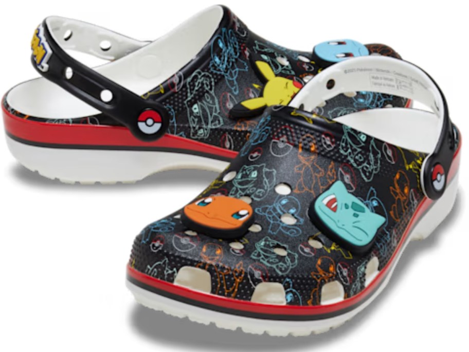a pair of black, red, blue, yellow, and orange Pokemon Crocs clogs