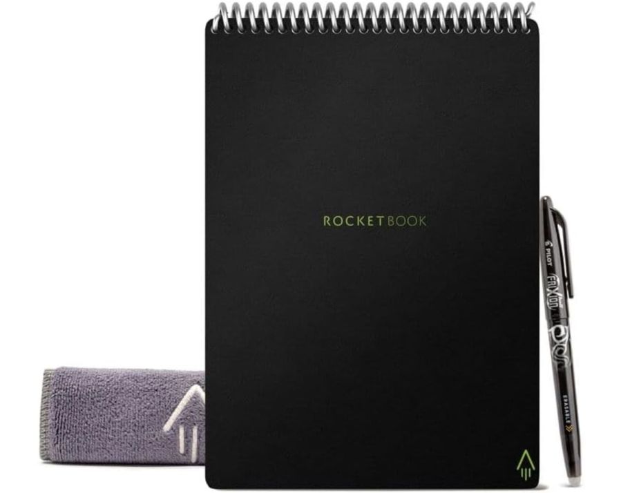 a black rocketbook flip shown with pen and towel