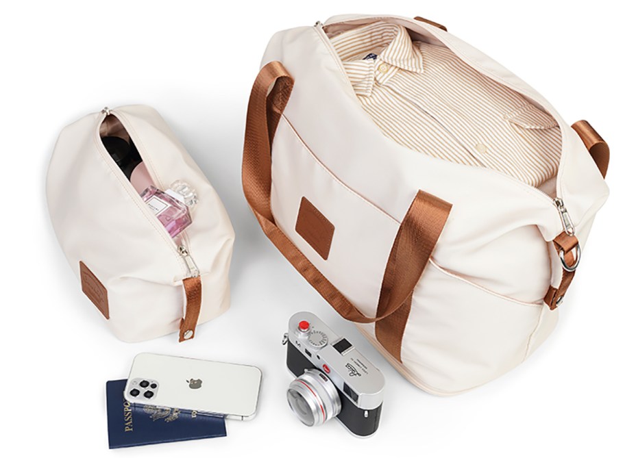 travel bags with camera, passport, and phone,