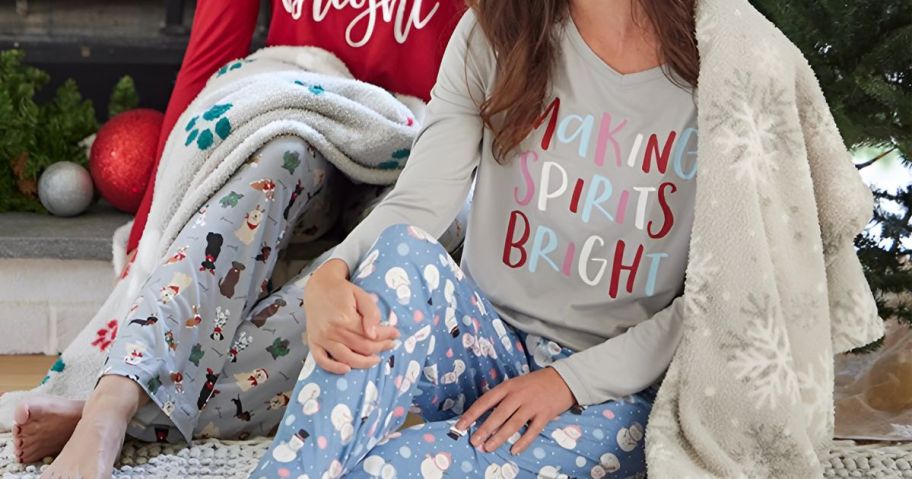 2 women wearing holiday pajamas 
