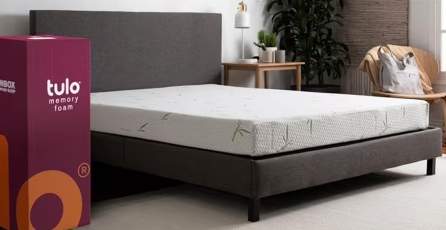 a bamboo memory foam mattress on a grey platform bed in a bedroom