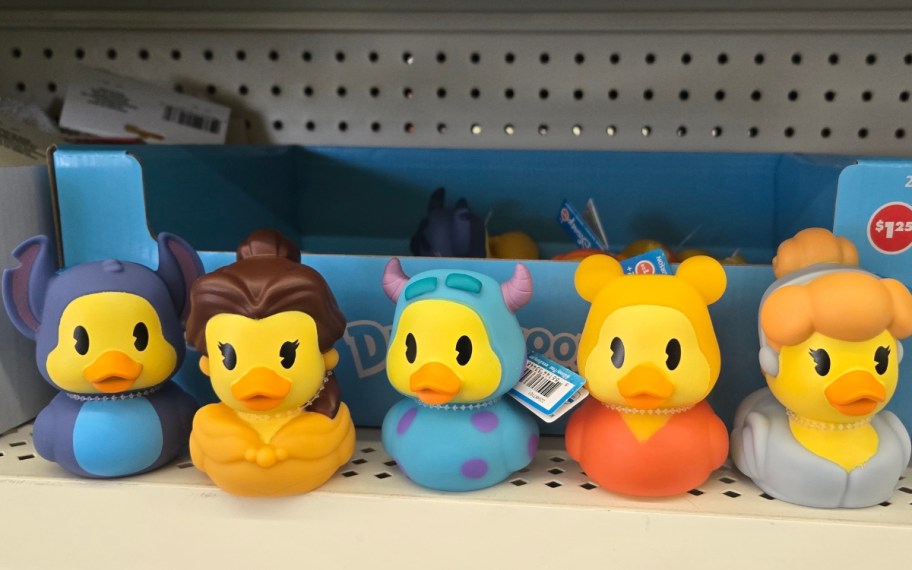 5 rubber duckies in a row on a store shelf