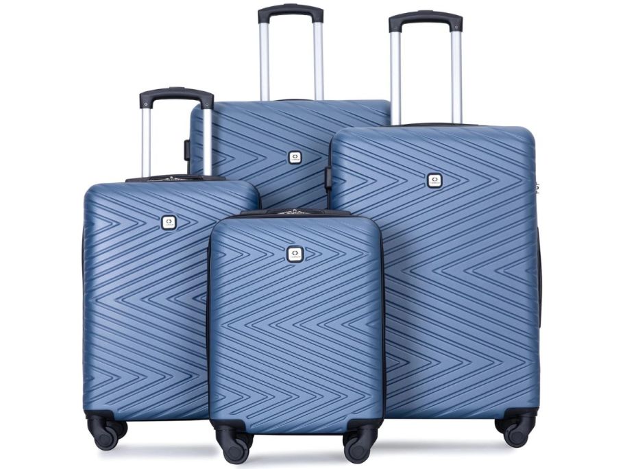 a blue 4 piece travelhouse luggage set stock image