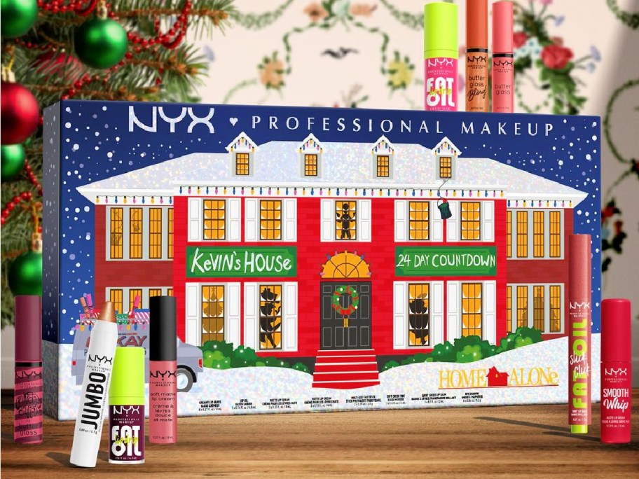 front view of nyx home alone advent calendar package with nyx cosmetics arranged on each side