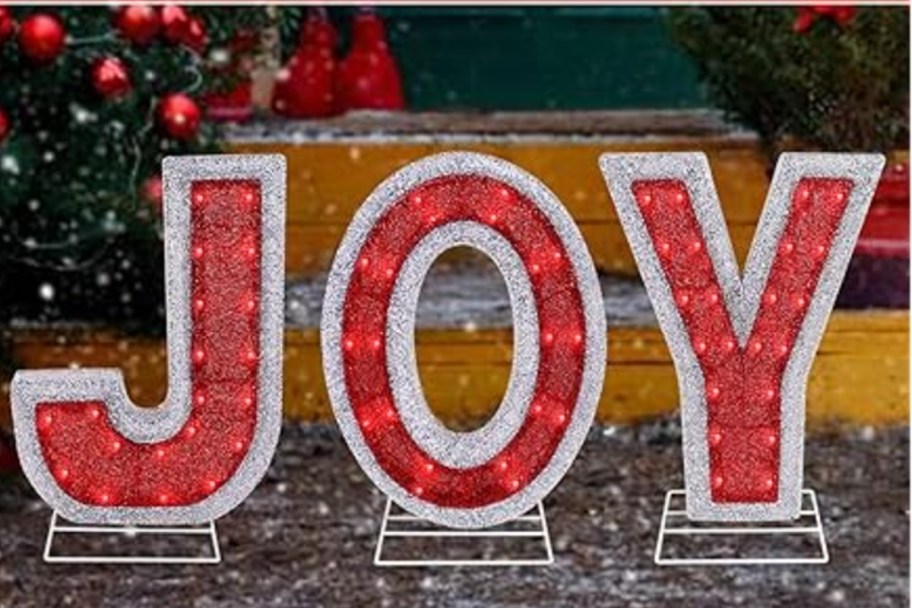 lighted outdoor J O Y letters