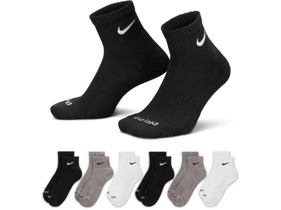 grey, black, and white Nike ankle socks