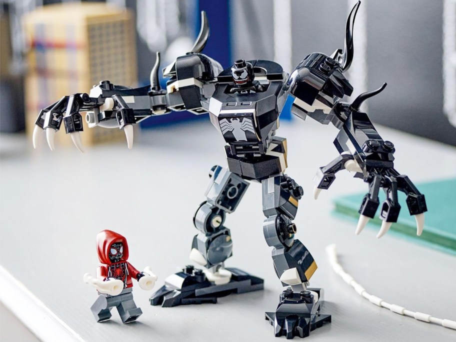 LEGO Marvel Venom Mech Armor vs. Miles Morales set on table