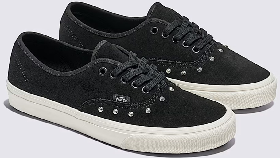 pair of black suede sneakers with studs