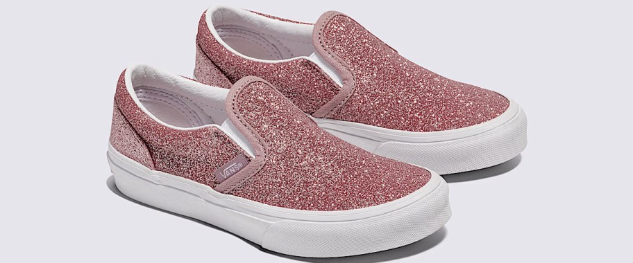 pair of pink glittery slip on shoes