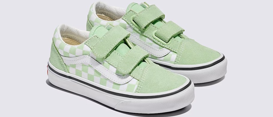 pair of green and white checkerboard velcro sneakers