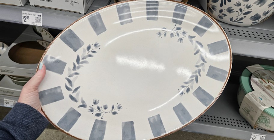 hand holding serving platter