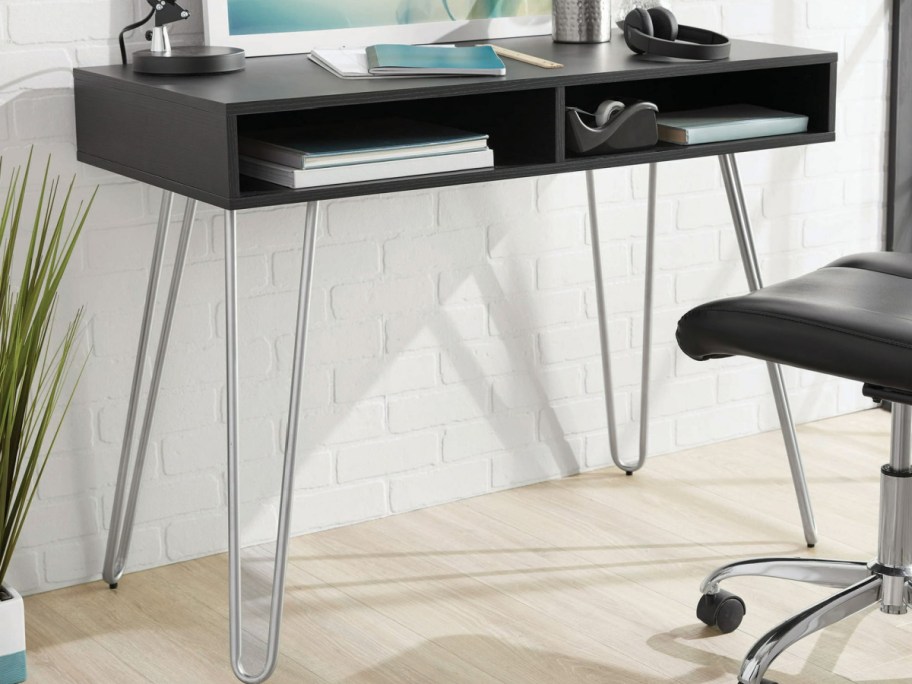 items displayed omitted black writing desk
