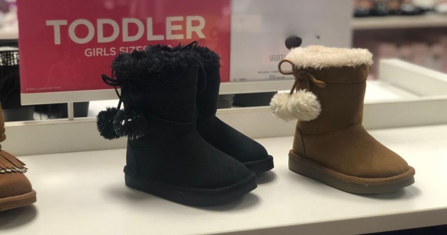 girls boots on display in store