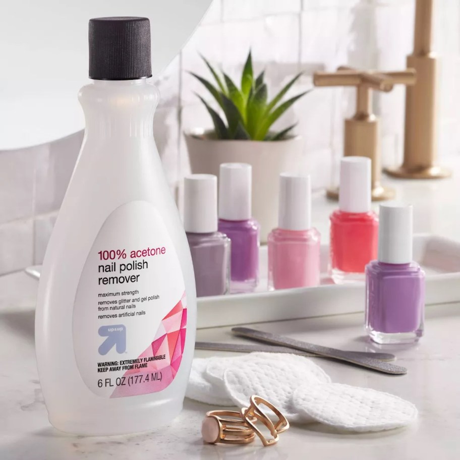nail polish remover and nail polish on bathroom counter