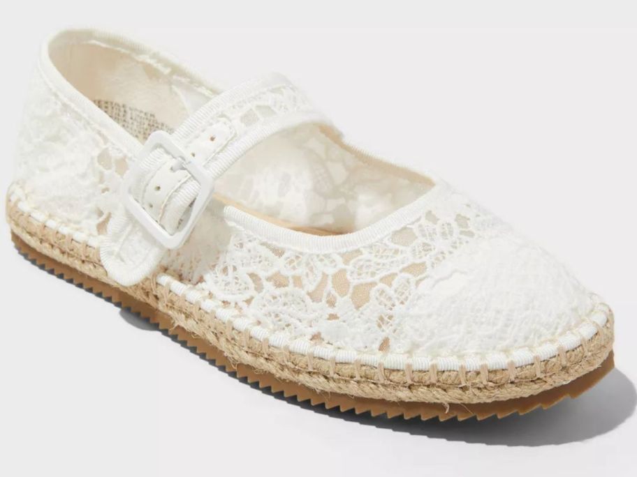 A white, lace kid's shoe