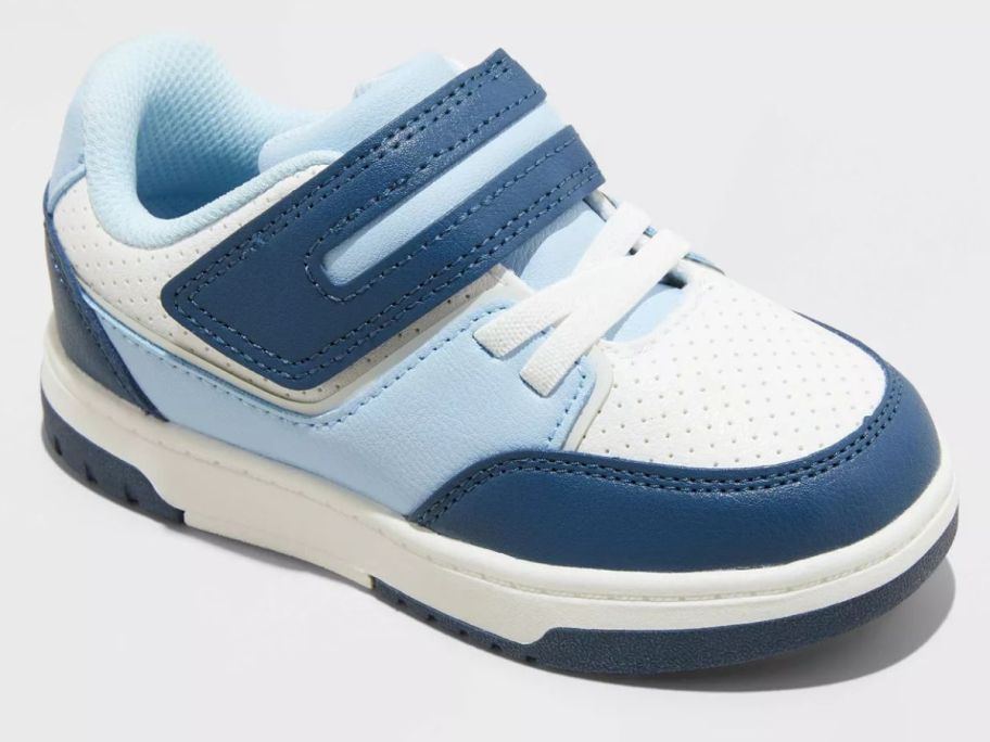 A blue and white toddler's sneaker
