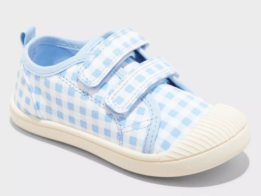 A blue and white toddler's sneaker