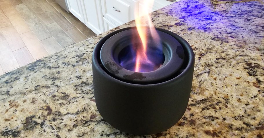 black ceramic mini fire pit on counter