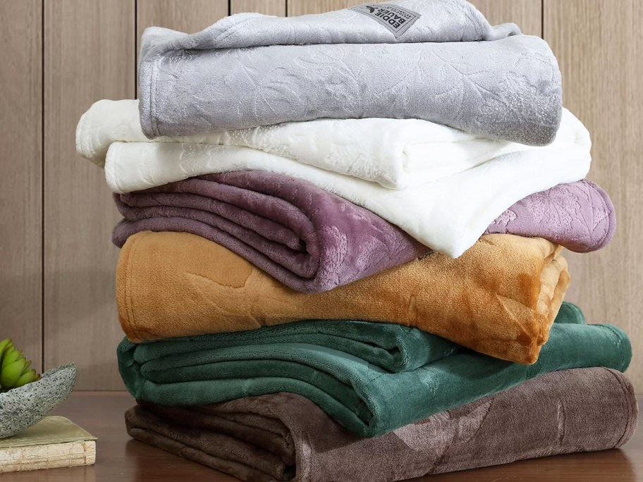 folded stack of throw blankets
