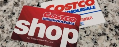 a Costco shop card and Costco membership card on granite counter