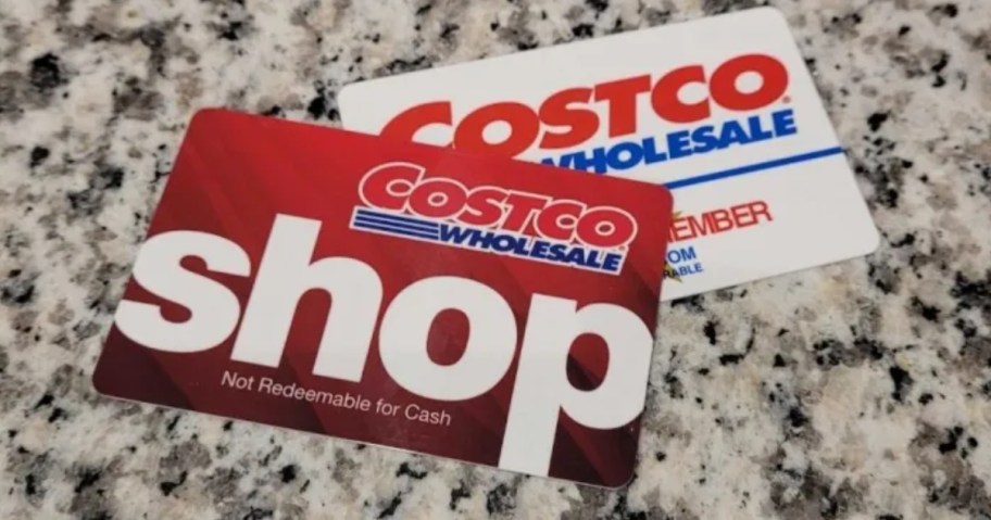 a Costco shop card and Costco membership card on granite counter