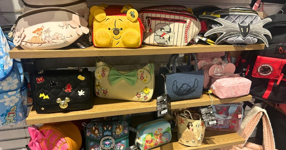 store display with various Disney Loungefly bags