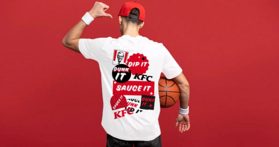 A man wearing a KFC Dunk It Shirt