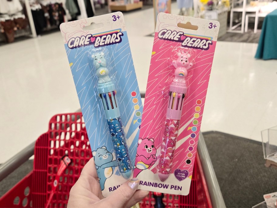 hand holding Care Bears pens
