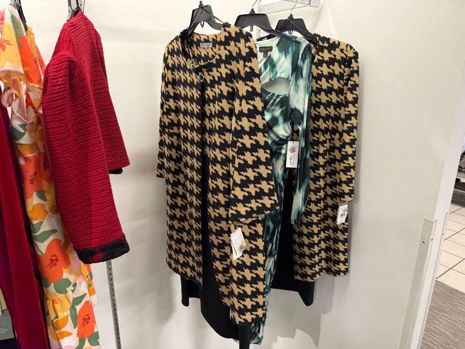 women's dresses hanging in store