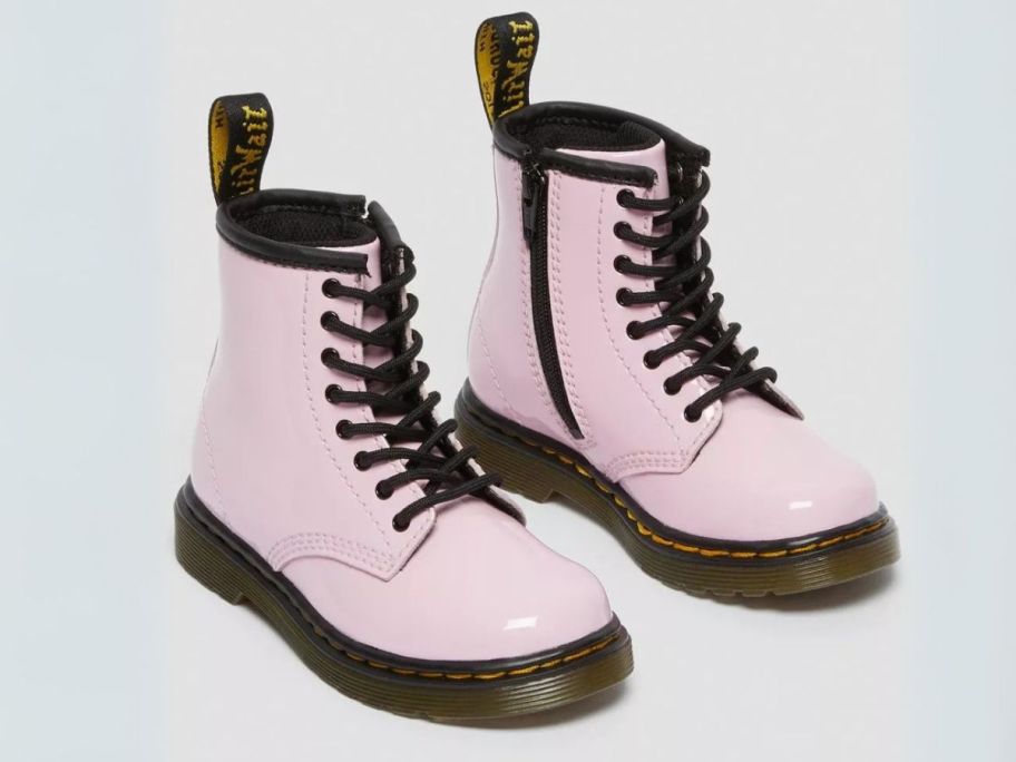 pink Dr. Martens Toddler 1460 Patent Leather Lace-Up Boot stock image