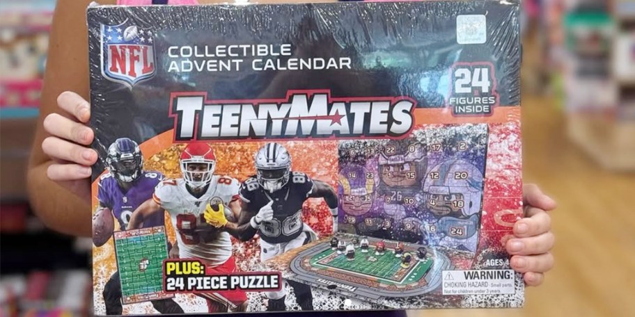 hands holding nfl teenymates advent calendar