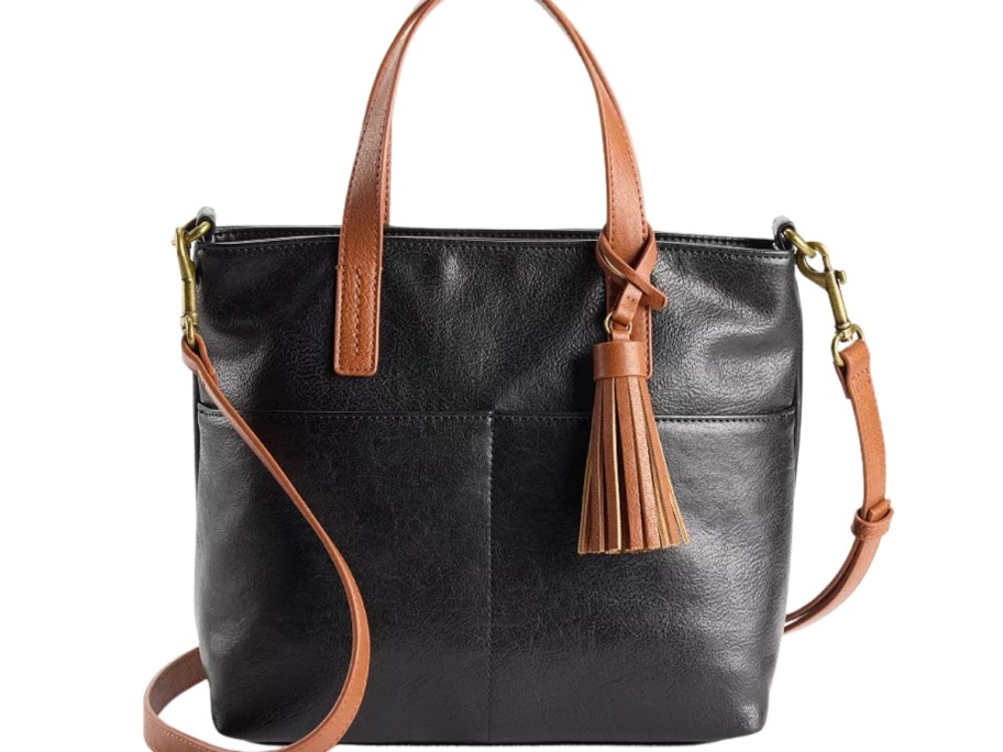 a black and tan tote style purse