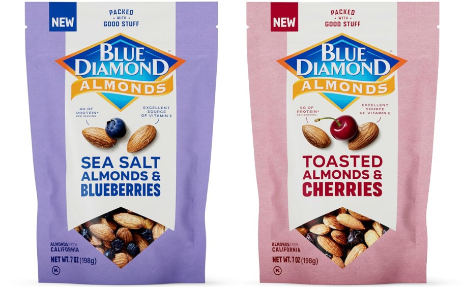 two packs of almonds with blueberries and cherries