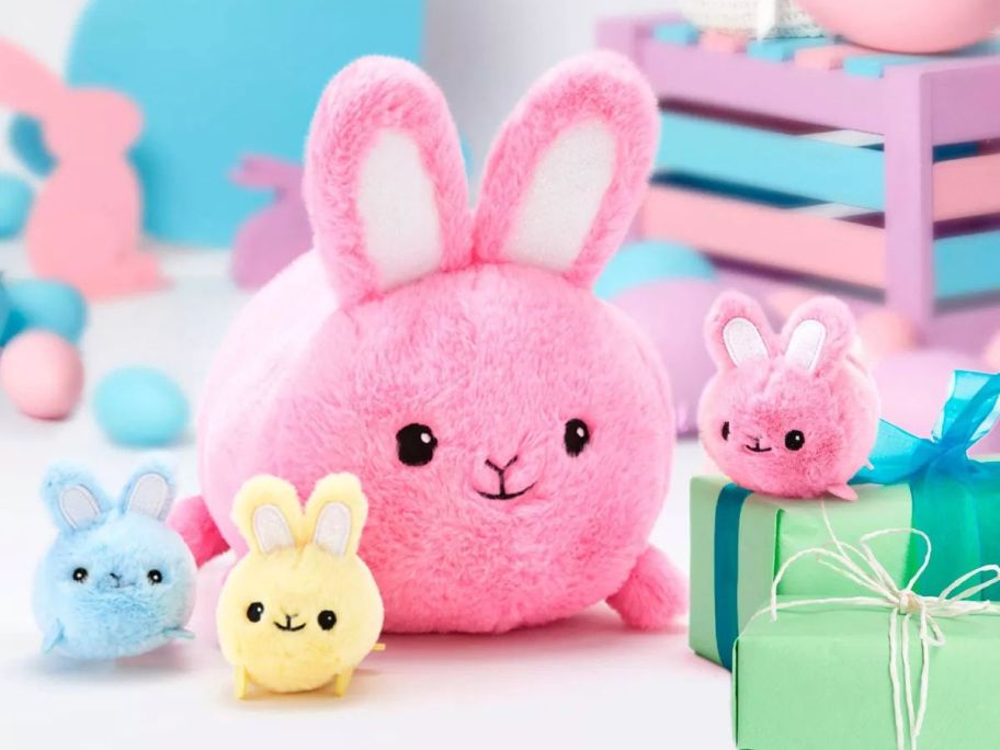 A plush mama bunny and her babies