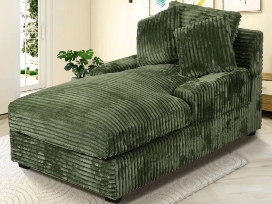 An Oversized Plush Chaise Lounge in Green