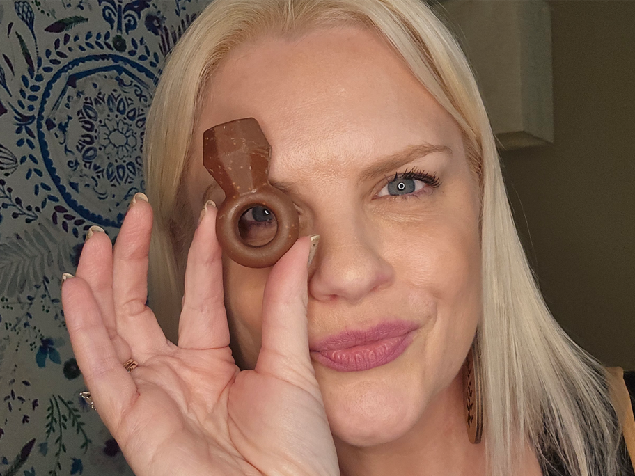 Ring Pop being held by a woman