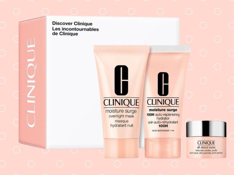 Discover Clinique box and three products in front of it against pink background