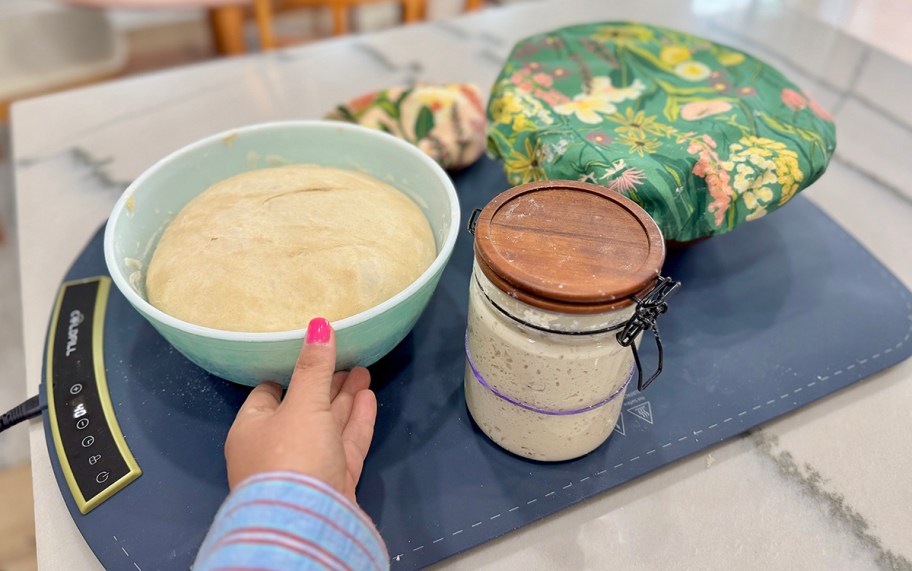 food placed on a food warming mat on a kitchen counter