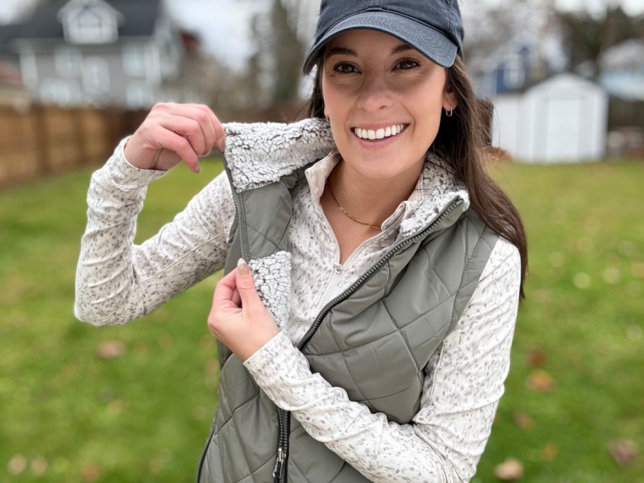 woman showing free country vest