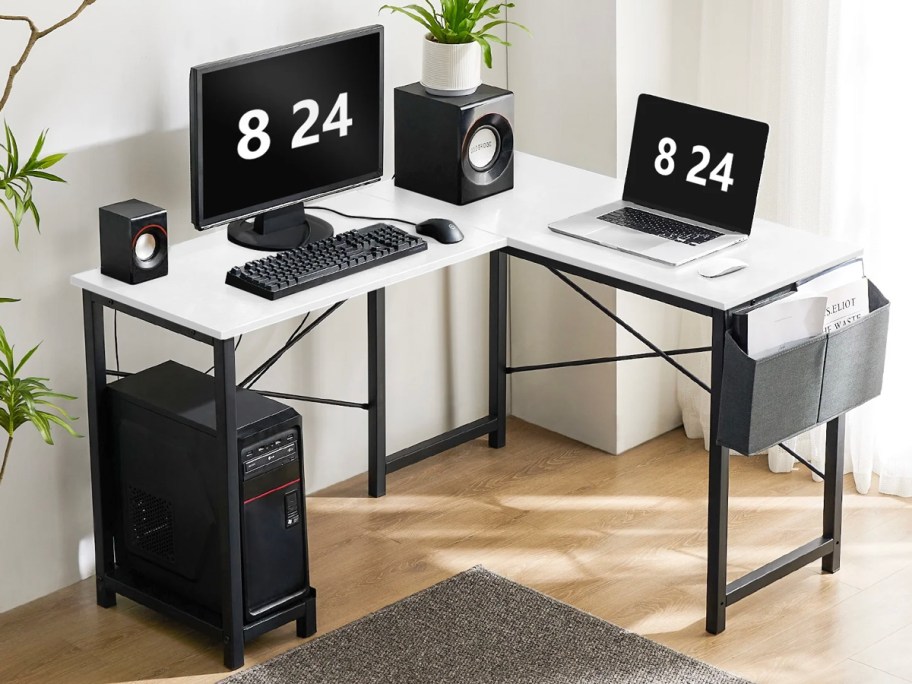 white and black l desk with computers on top