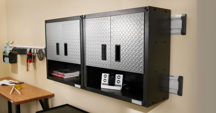 two Gladiator 3/4 Door Wall GearBox 28" x 28" x 12" Wall-Mounted Steel Garage Cabinets on wall in garage