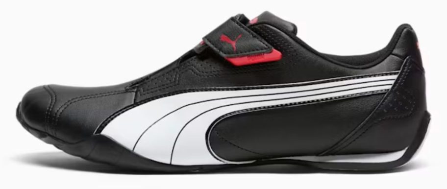 black, white, and red PUMA Men's Redon Move Men's Shoe stock image