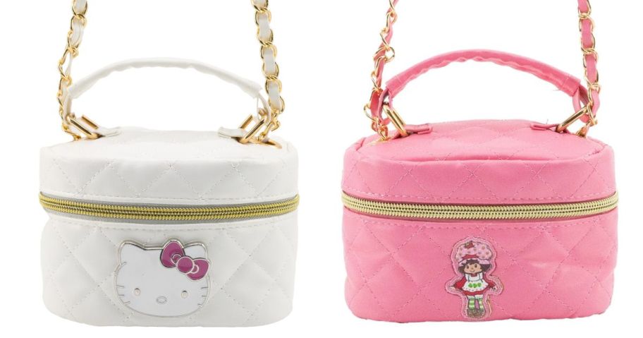a white hello kitty and a pink strawberry shortcake purse