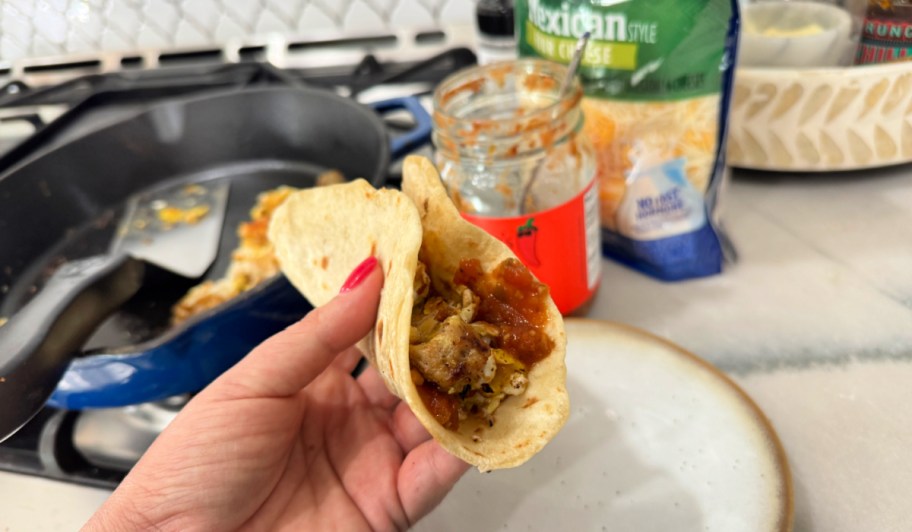 sourdough discard tortilla with eggs, sausage cheese and salsa 