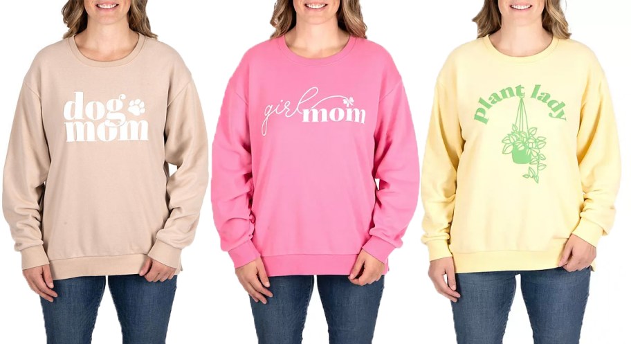 three women wearing tan, pink, and yellow mom sweatshirts