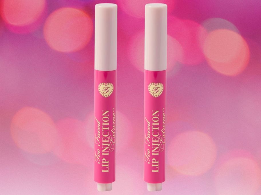 Too Faced Lip Injection Extreme Plumping Clicks 2-Piece Set against pink background